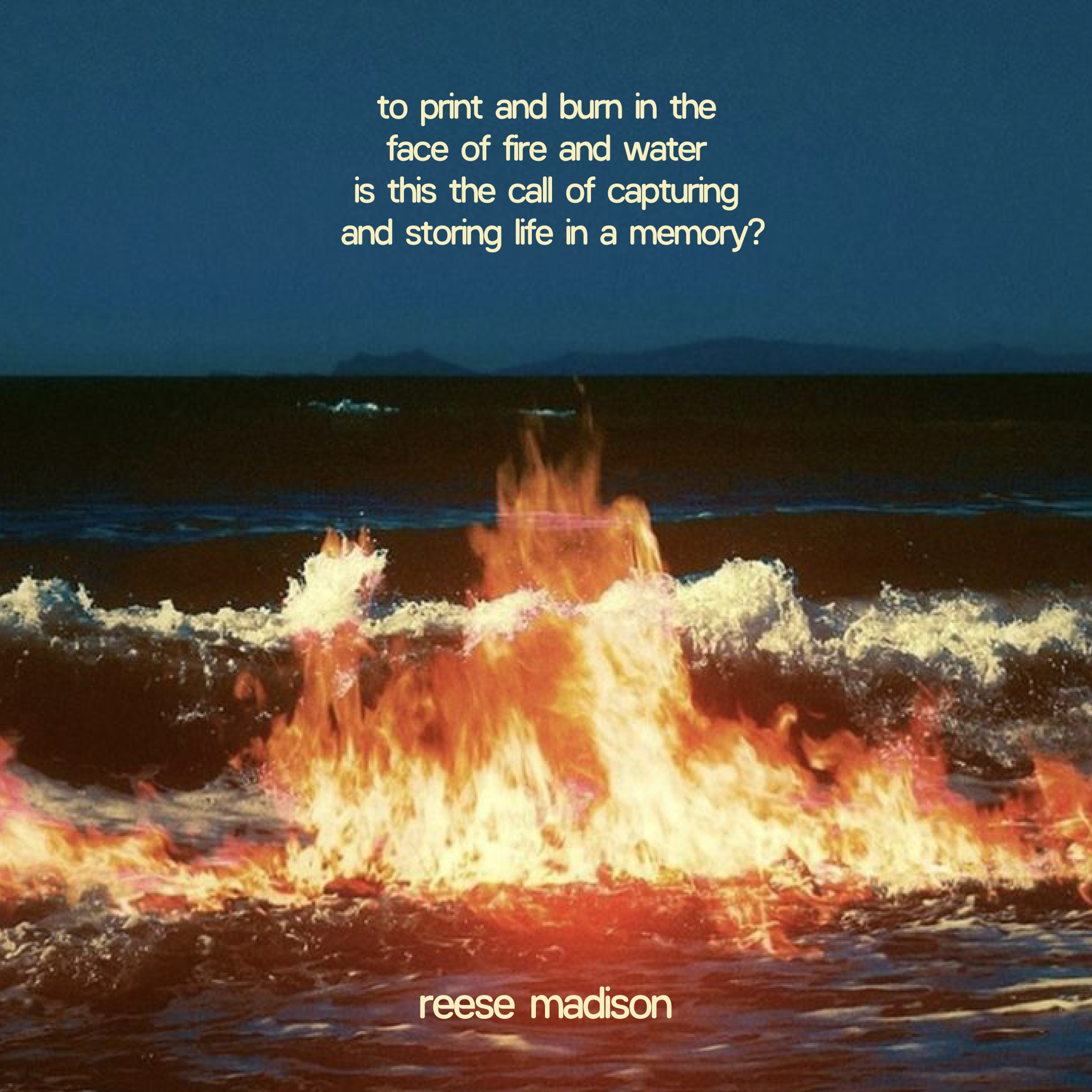 A large fire blazes on the surface of dark ocean water at night, with white text above the flames displaying a reflective poem by Reese Madison. Mountains are faintly visible in the distant background.